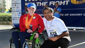 Cassie Mitchell, assistant professor in the Wallace H. Coulter Department of Biomedical Engineering at Georgia Tech and Emory, with Dr. Vamsi Kota at the 2016 Winship Win the Fight 5K.