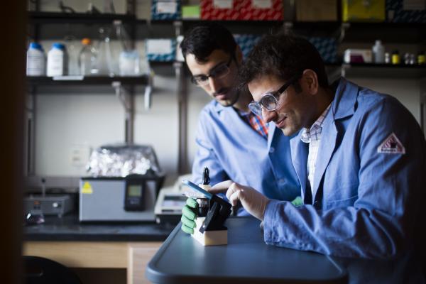 Aaron Blanchard and Khalid Salaita, associate professor of chemistry at Emory. (image 2)