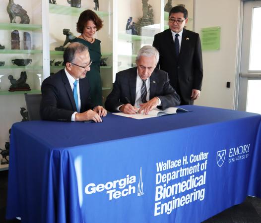 The Nakatani agreement being signed by Yves Berthelot, vice provost for international initiatives at Georgia Tech.