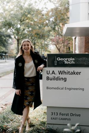 Sarah Bush, 2018 biomedical engineering graduate, in front of the U.A. Whitaker Building.