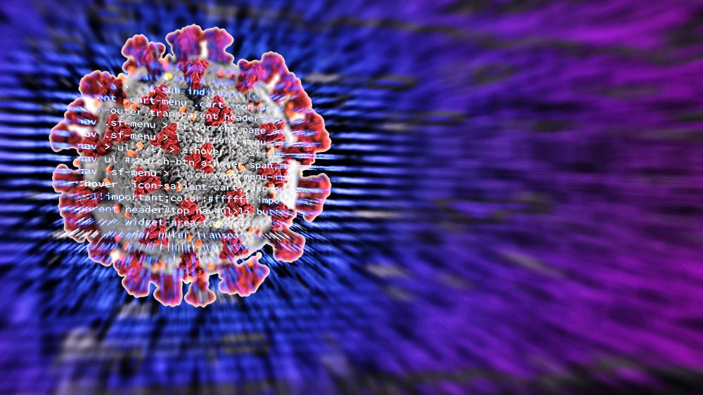Illustration of a coronavirus against the backdrop of computer code. The code is clear in the center of the virus and spreads outward out of focus. (Illustration: Joshua Stewart; Computer Code Image via Negative Space via Pexels.)