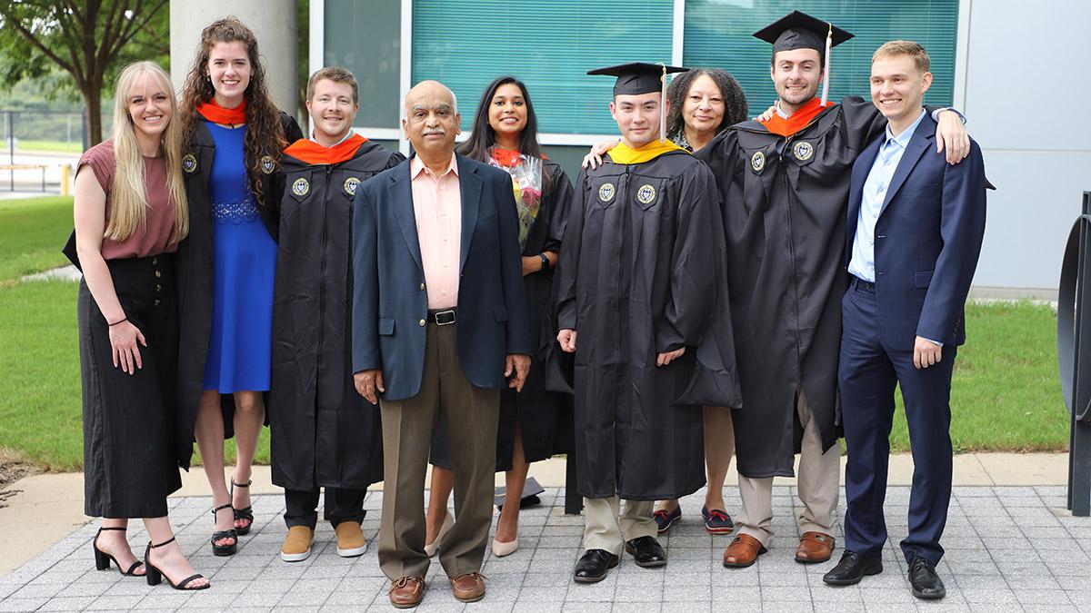 Group photo of some MBID graduates with program leader Sathya Gourisankar. (Photo: Joshua Stewart)