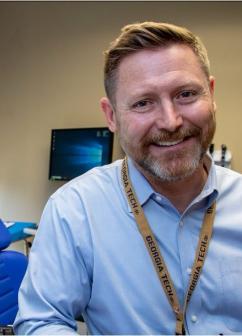 Dr Gore in photo in his lab at the Shepherd Center