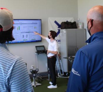 Second-year mechanical engineering student Brittan Pero talks through some of the data collected during tests of a 3D-printed putter with Tech alumni Reagan Cink, left, and his father, Stewart, a PGA Tour pro golfer. Pero joined the project this summer to help with testing and build on the design created by biomedical engineering student Caroline Means. (Photo: Joshua Stewart)