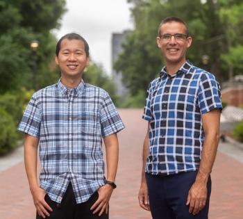 Peng Qiu, left, and Joshua Weitz are leading a new National Institutes of Heath-funded training program that will help transform the study of quantitative- and data-intensive biosciences at the Georgia Institute of Technology. (Photo: Allison Carter)
