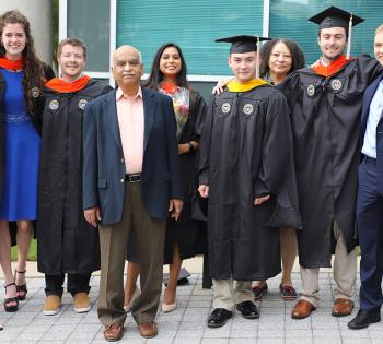 Group photo of some MBID graduates with program leader Sathya Gourisankar. (Photo: Joshua Stewart)