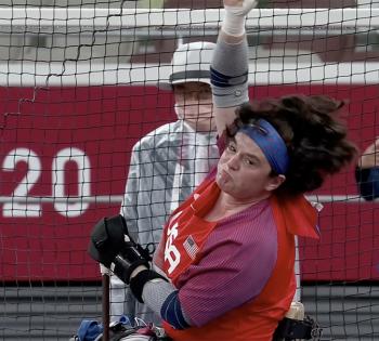 In this screenshot from NBCOlympics.com, Cassie Mitchell throws a personal-best (and American record) 24.18 meters in the club throw at the Tokyo Paralympics.