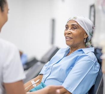 A patient receives chemotherapy treatment from a nurse. (Photo Courtesy: Centers for Disease Control and Prevention)