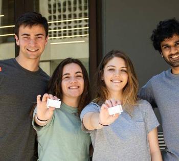 The StrideLink team members display the device and hardware components