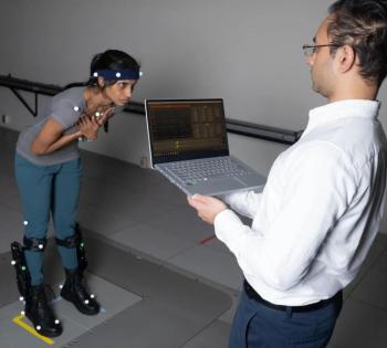 On the left side of the photo is postdoctoral fellow Surabhi Simha demonstrating robotic ankle exoskeleton boots while research engineer Rish Rastogi, right, monitors some of the data being collected on a laptop.