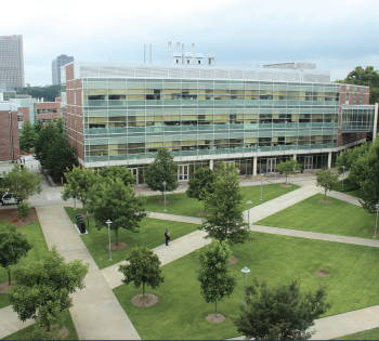 Photo of the U.A. Whitaker Building at Georgia Tech in front of the grassy quad area