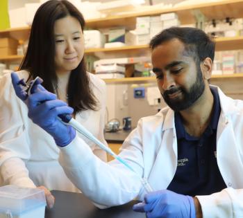 Photo of Leslie Chan and graduate student Vishal Manickam