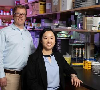 Photo of Coulter BME Professor Brandon Dixon and microsurgeon and Ph.D. student Shao Yun Hsu standing together in Dixon's lab.