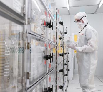 Georgia Tech graduate research assistant Mason Chilmonczyk prepares to fabricate a Dynamic Mass Spectrometry Probe in the Institute of Electronics and Nanotechnology’s Marcus Building clean room. (Credit: Rob Felt, Georgia Tech)