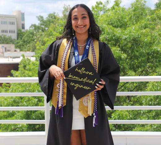 Photo of spring 2025 graduate Sriya Surapaneni in her cap and gown.