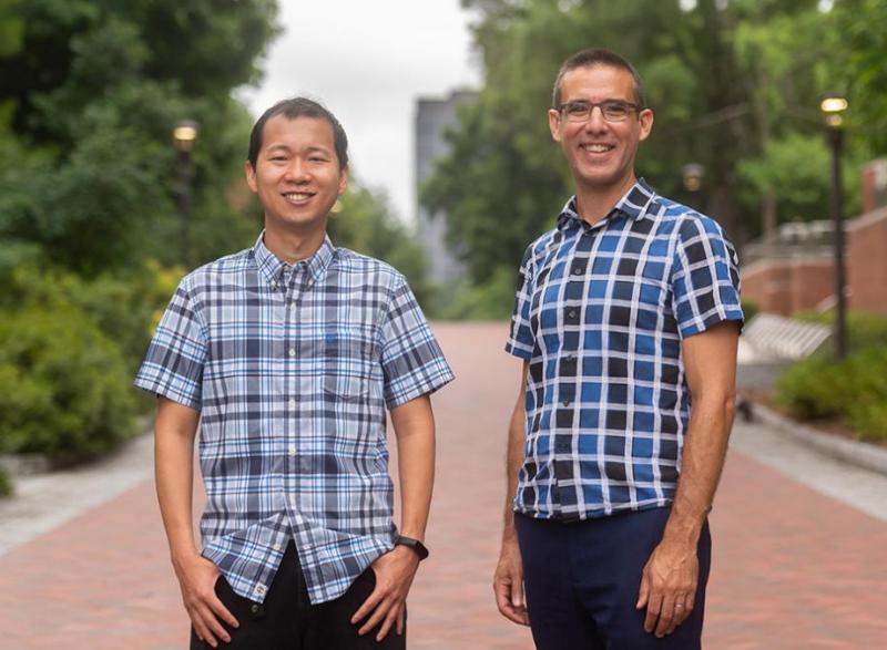 Peng Qiu, left, and Joshua Weitz are leading a new National Institutes of Heath-funded training program that will help transform the study of quantitative- and data-intensive biosciences at the Georgia Institute of Technology. (Photo: Allison Carter)