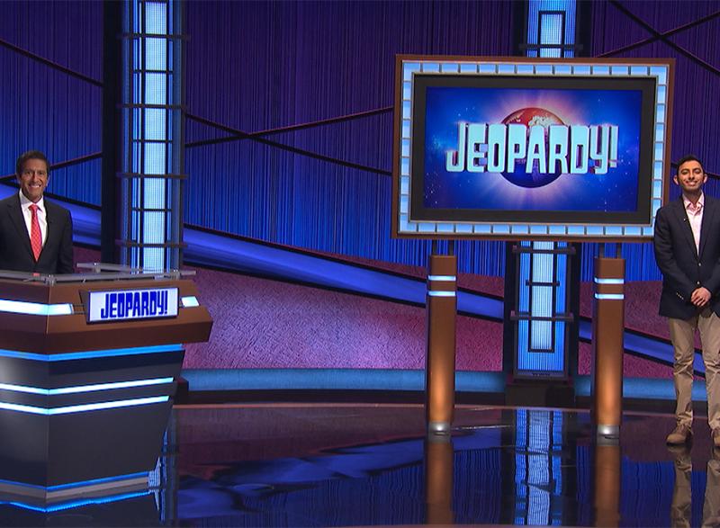 Biomedical engineering student Keshav Shah in the Jeopardy! studio with fill-in host Sanjay Gupta. After years of taking the contestant quiz, Shah competed on show Jeopardy! on the July 7, 2021, episode. (Photo Courtesy: Keshav Shah)