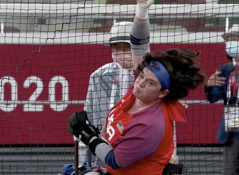 In this screenshot from NBCOlympics.com, Cassie Mitchell throws a personal-best (and American record) 24.18 meters in the club throw at the Tokyo Paralympics.