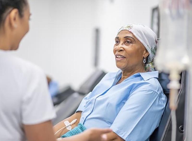 A patient receives chemotherapy treatment from a nurse. (Photo Courtesy: Centers for Disease Control and Prevention)