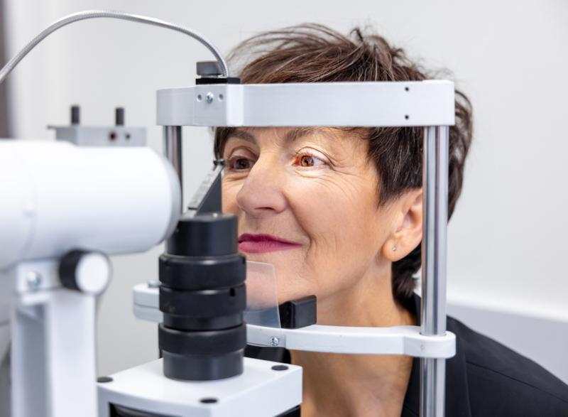 Older woman getting an eye exam