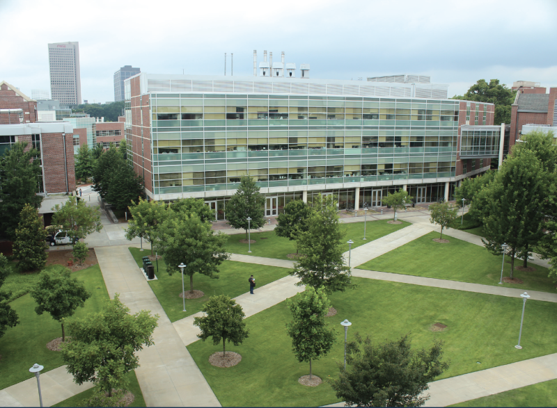 Photo of the U.A. Whitaker Building at Georgia Tech in front of the grassy quad area
