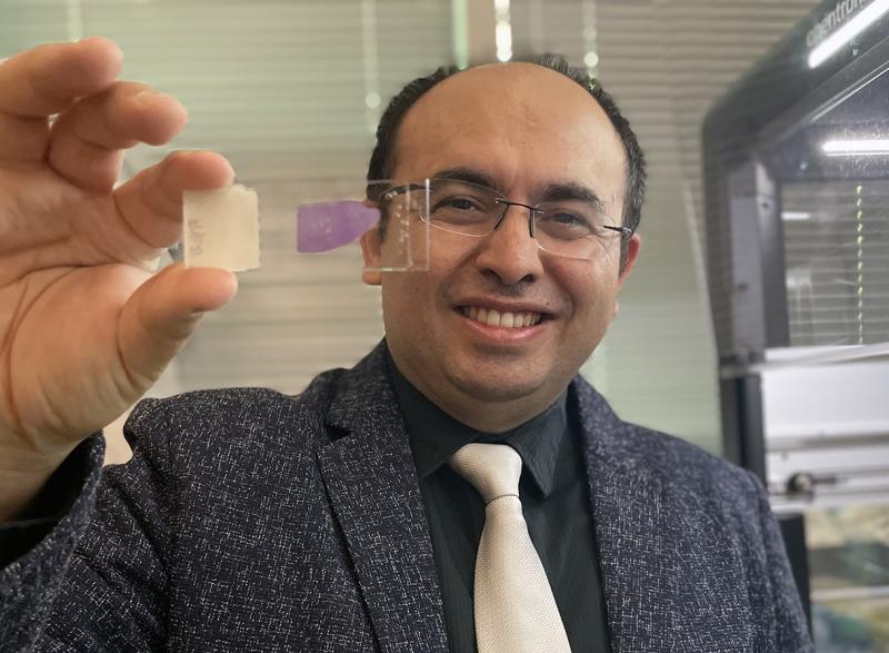 Coskun with sample slide