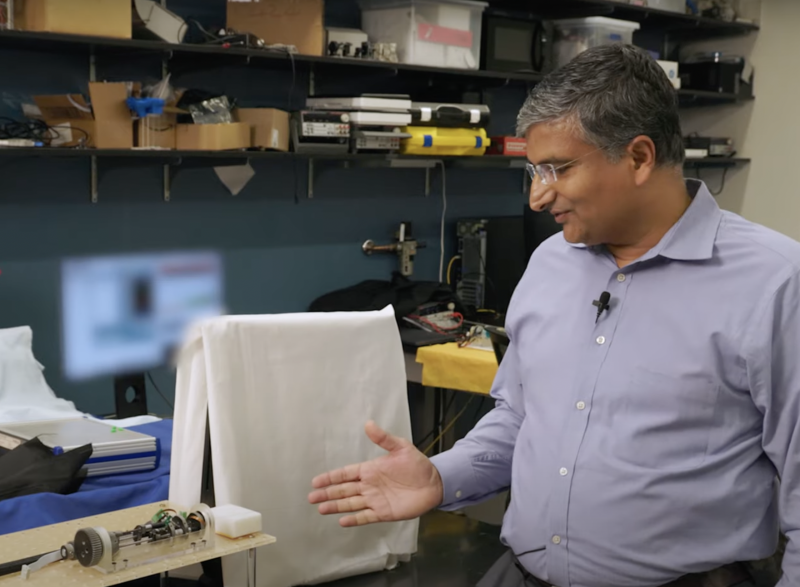 Jaydev Desai with COAST robot