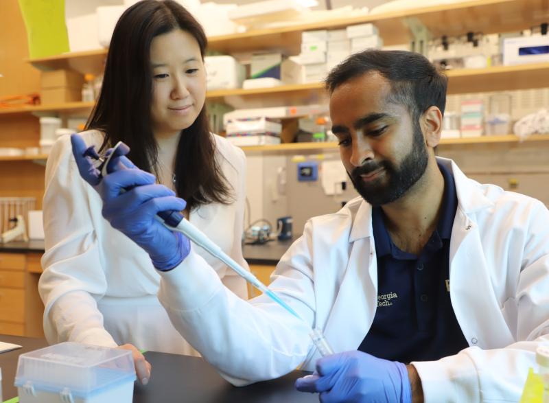 Photo of Leslie Chan and graduate student Vishal Manickam