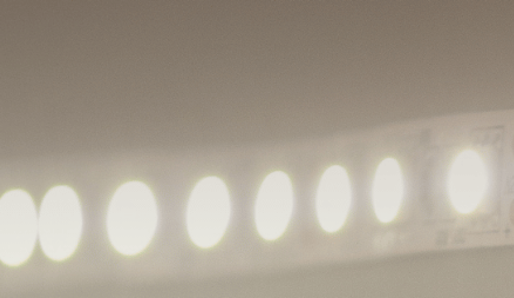 Flashing lights on a strip across a surface